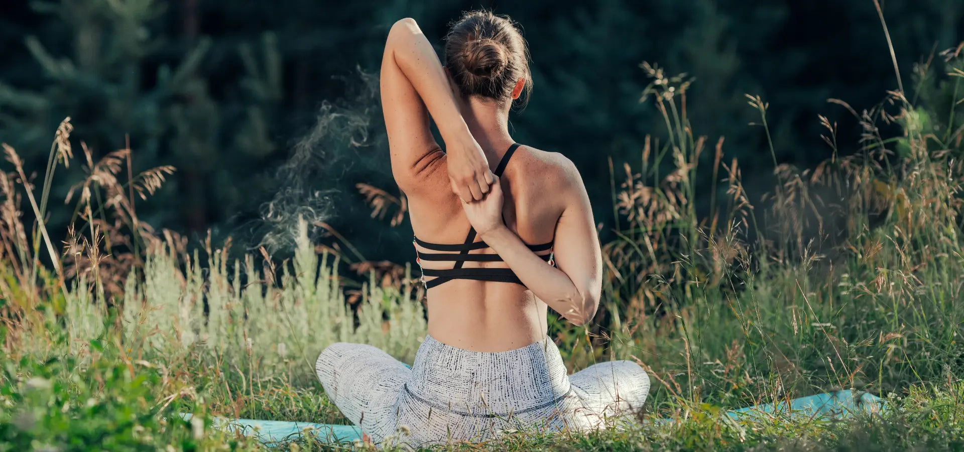 Women meditating on the jungle
