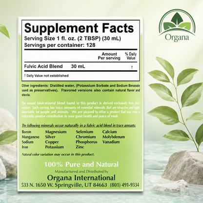 A supplement facts label for Organa International's Fulvic Acid Blend, displayed on a light green background with leaf graphics and rocks. The label details serving size, ingredients, and mineral content.